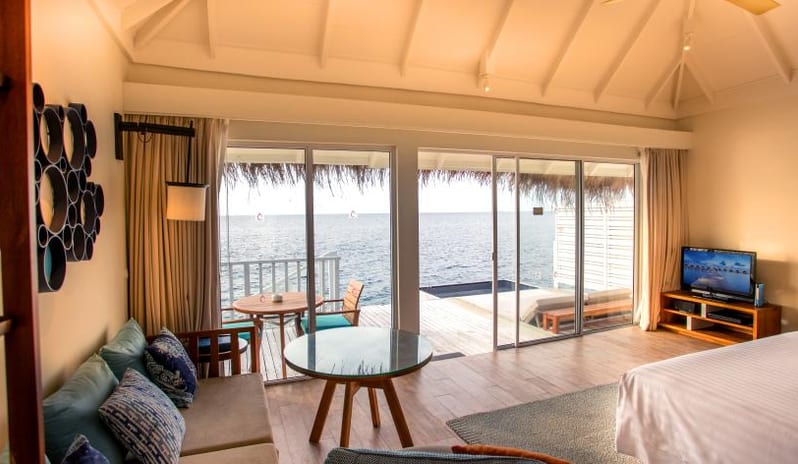 Centara Grand Island Maldives - Sunrise Overwater Villa View from the Bedroom